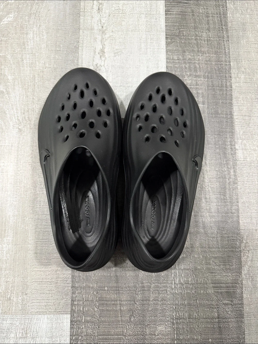 Nike Black ReactX Rejuven8 Slip-Ons